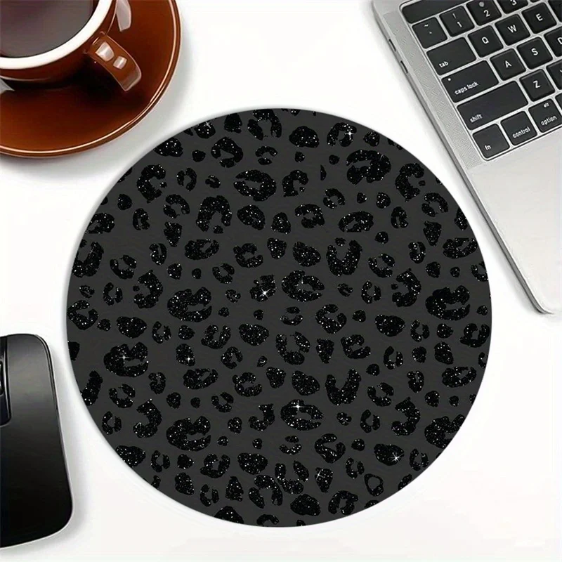 

The stylish black panther printed round mouse pad with an anti-slip rubber base is suitable for both office and home use