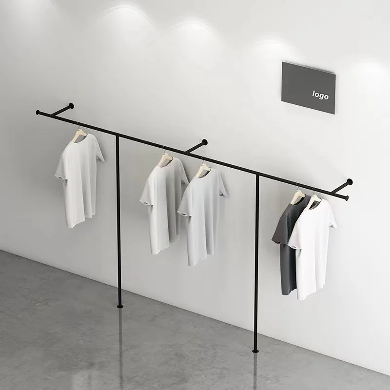 

clothing store display rack Cream white wall hanging clothes rod floor display rack for children's clothing stores