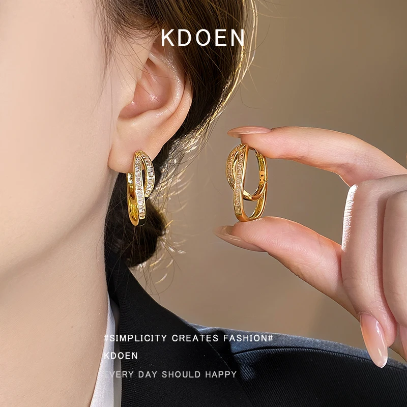 Neu eingetroffene luxuriöse Doppelkreis-Zirkon-Ohrringe in Goldfarbe für Damen, elegantes Ohrklemmen-Accessoire, einzigartiger, stilvoller Ohrschmuck