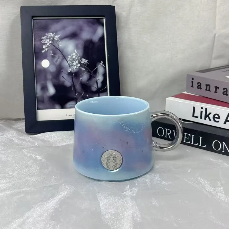 

Starbucks 12oz Lead-Free Celestial Themed Coffee Mug with Silver Whale Tail Lid and Metallic Handle