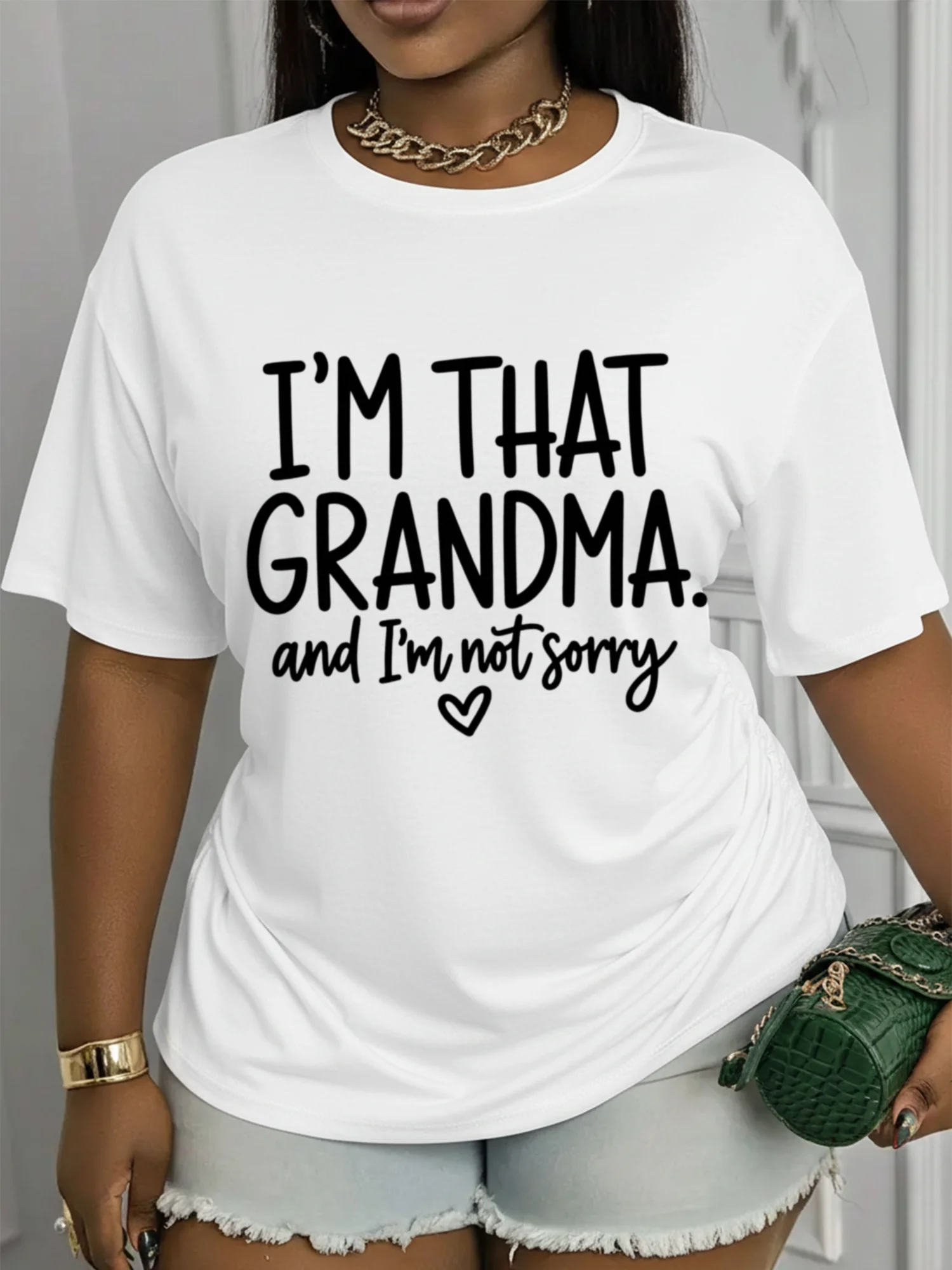 Crew Neck Short-Sleeve Printed T-Shirt Featuring The Graphic Design: 'I'M That Grandma, And I'M Not Sorry.' This Stylish Top Boasts a Casual Crew Neckline, Soft And Stretchy Fabric