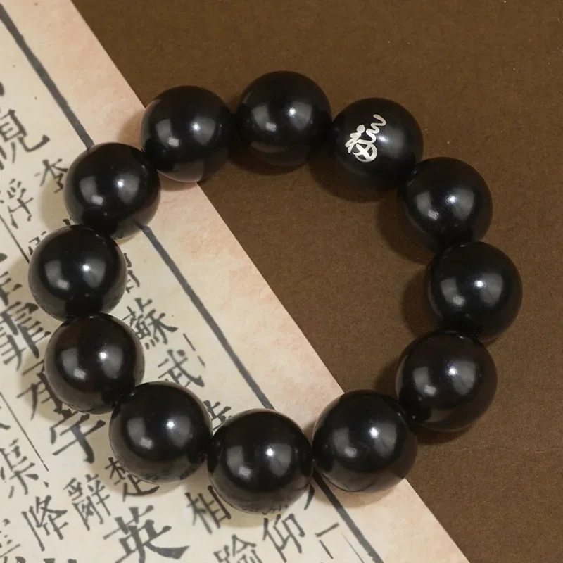 

Hot selling natural ebony bracelet for men and women with silver inlaid lucky words, antique purple light sandalwood Buddha bead