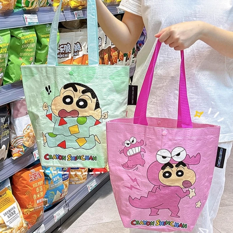 

Crayon Shinchan Kawaii Canvas Bag Anime Character Student Commuter Handheld Cotton Bag Cute Bento Box Small Bag Birthday Gift
