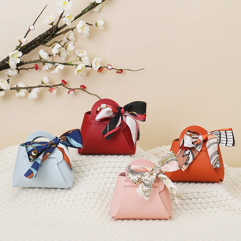 

40PCS Leather Gift Bags Bow Ribbon Packaging Bag Wedding Favour Distributions Bags Christmas Candy Packaging Box Mini Handbag