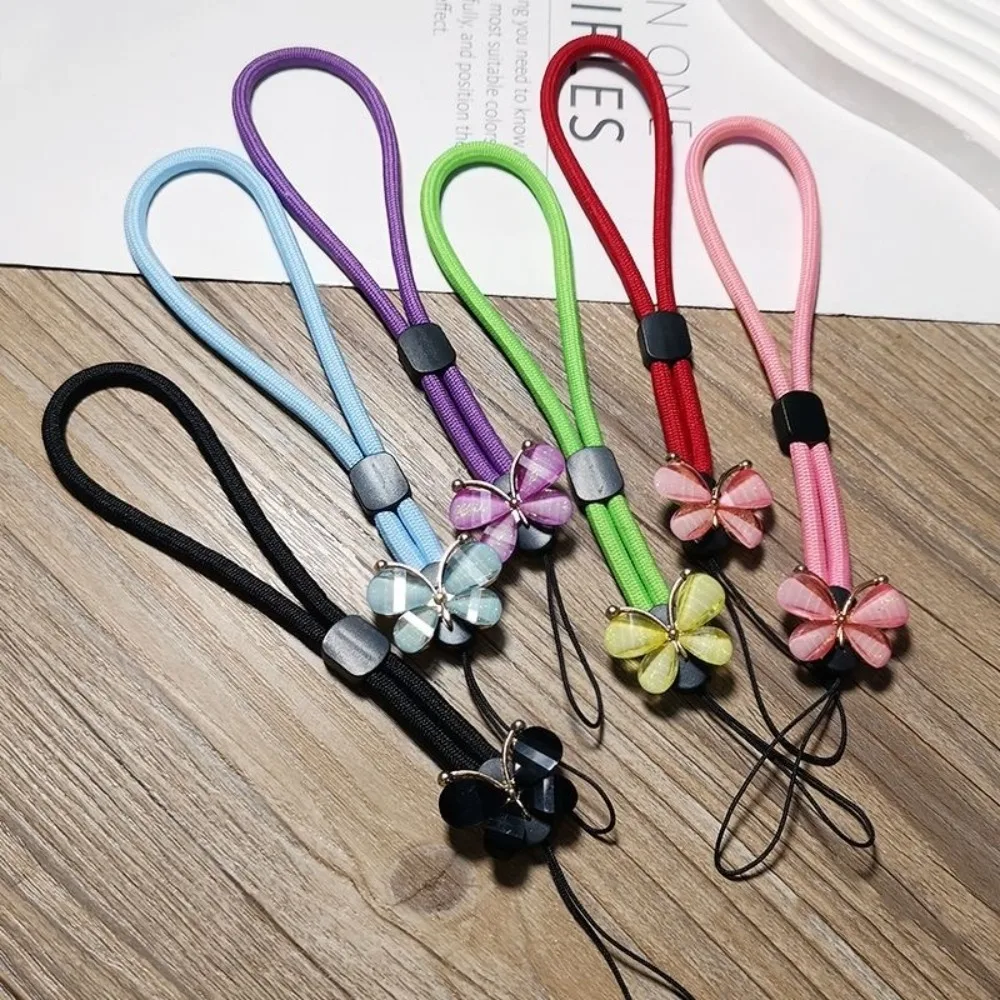 Bracelet de téléphone simple papillon en cristal, sangle de poignet pour femmes, étui de téléphone universel à face latérale