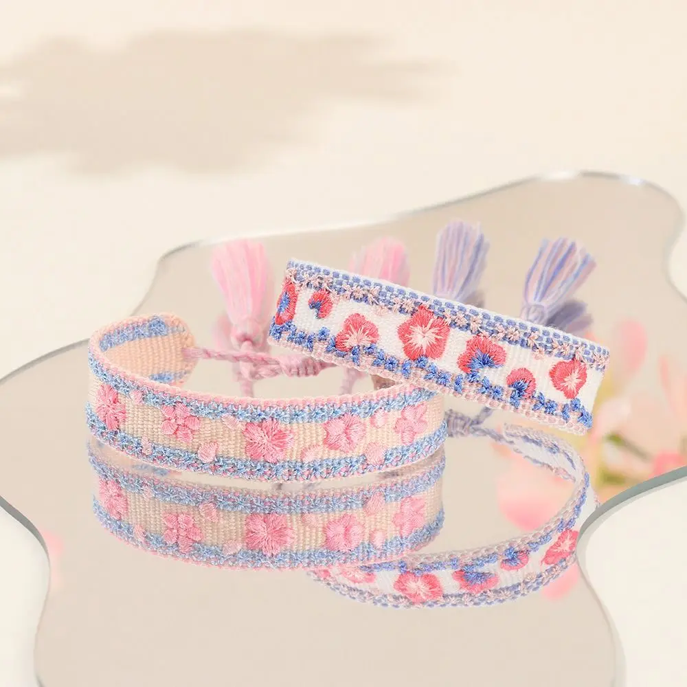 أساور زهرة ملونة مطرزة حبل قابل للتعديل أساور منسوجة فريدة ومحظوظة قابلة للتكديس بشرابة