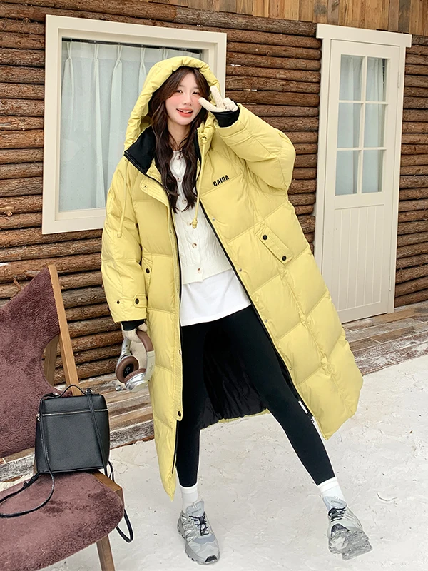 

Желтая ультратеплая женская зимняя удлиненная куртка с капюшоном, новая модель, выше колена, приталенная, с наполнителем из белого пуха, верхняя одежда