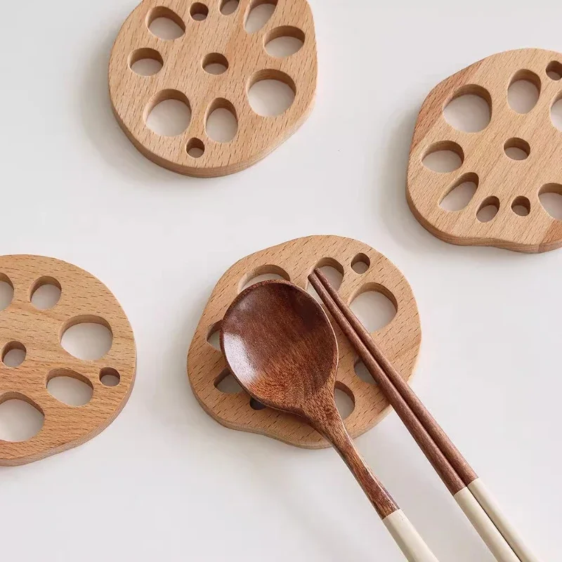 Log lotus root slices, chopstick rack, tableware rack, heat insulation pad, chopstick holder, spoon, wooden coaster