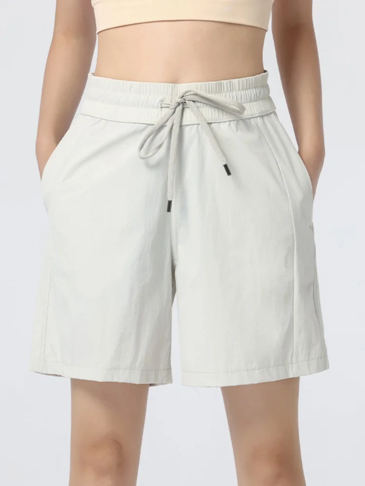 Shorts de sport pour femmes PHIGEER pour la course à pied, shorts décontractés d'été amples et athlétiques, shorts de yoga avec cordon de serrage à la taille et poches