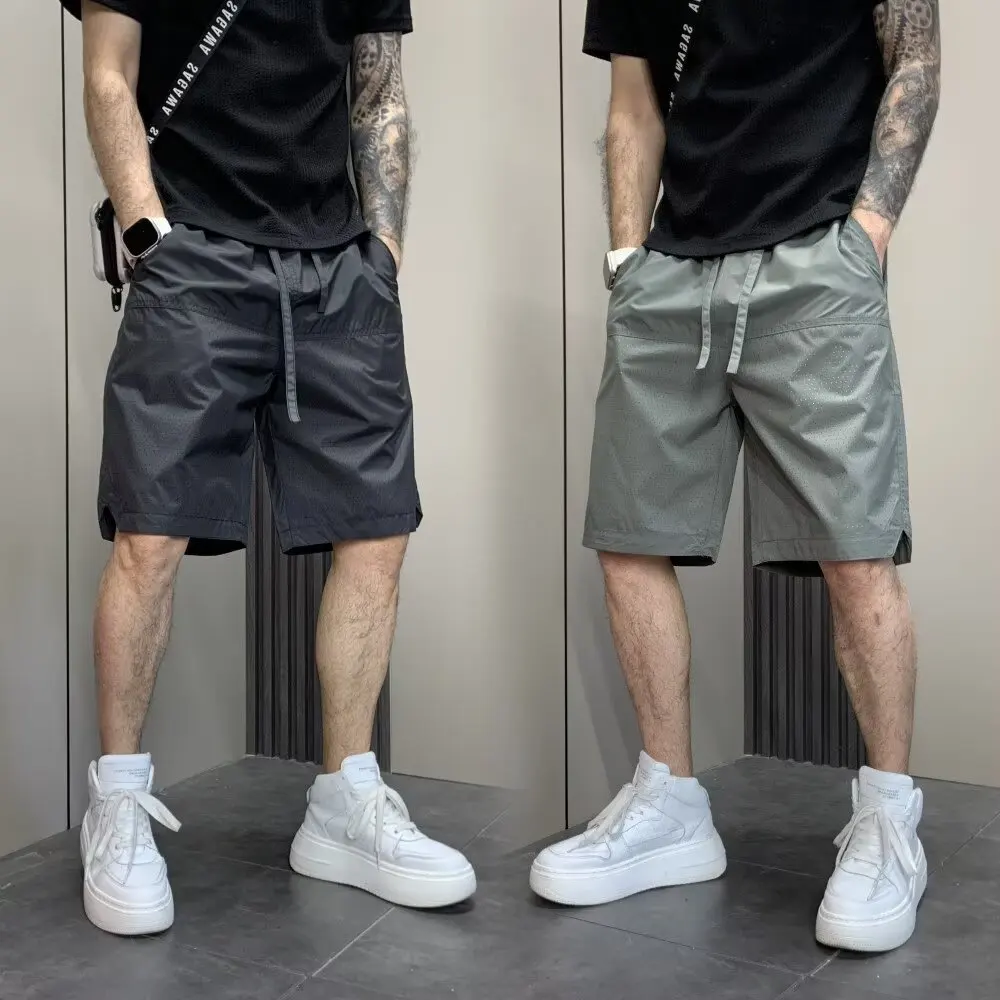 

Лето 2025 г., дышащие, быстросохнущие повседневные шорты с лазерной перфорацией для мужчин, простые, модные, универсальные, свободные спортивные шорты Five Qu