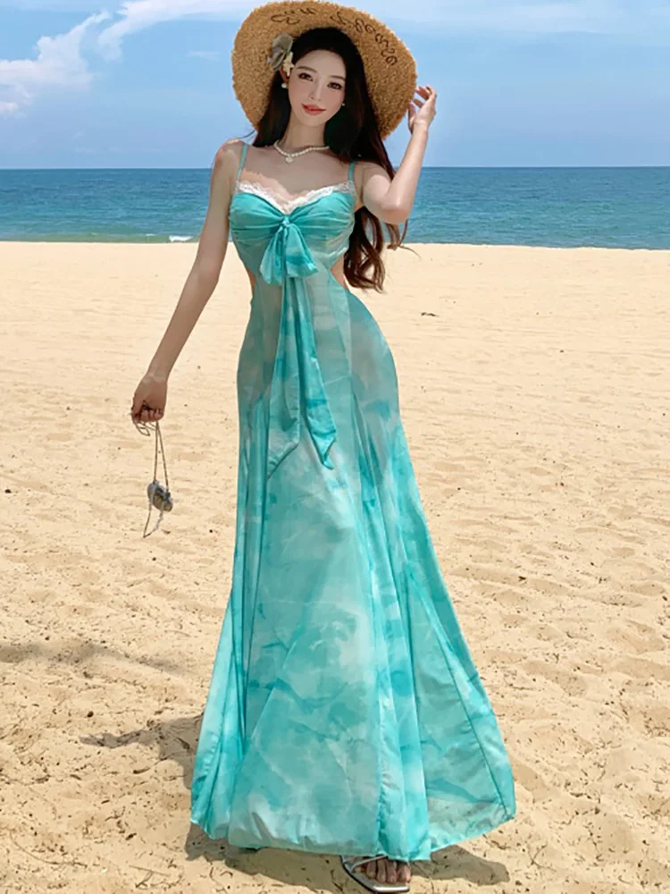 ฤดูร้อนสีเขียวตาข่ายพิมพ์ Hollow OUT ชุดผู้หญิงโบว์ลูกไม้สแควร์เซ็กซี่ชุดสลิง 2025 ใหม่เกาหลีสไตล์ชายหาดชุด