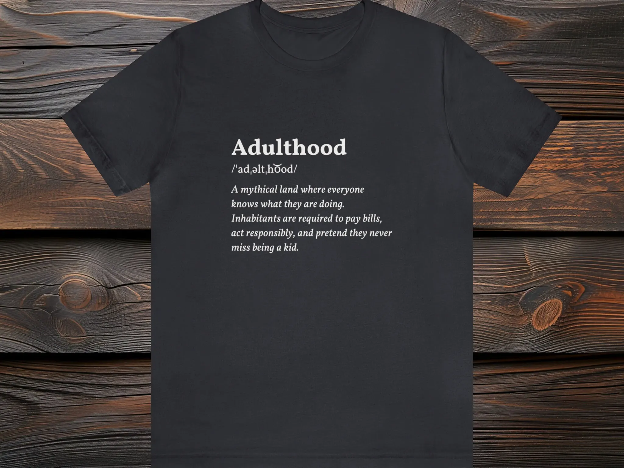 Adulthood - Definition Tee | Funny T-Shirt, Quirky Comfort for The Reluctant Grownup By PromptDesignArt