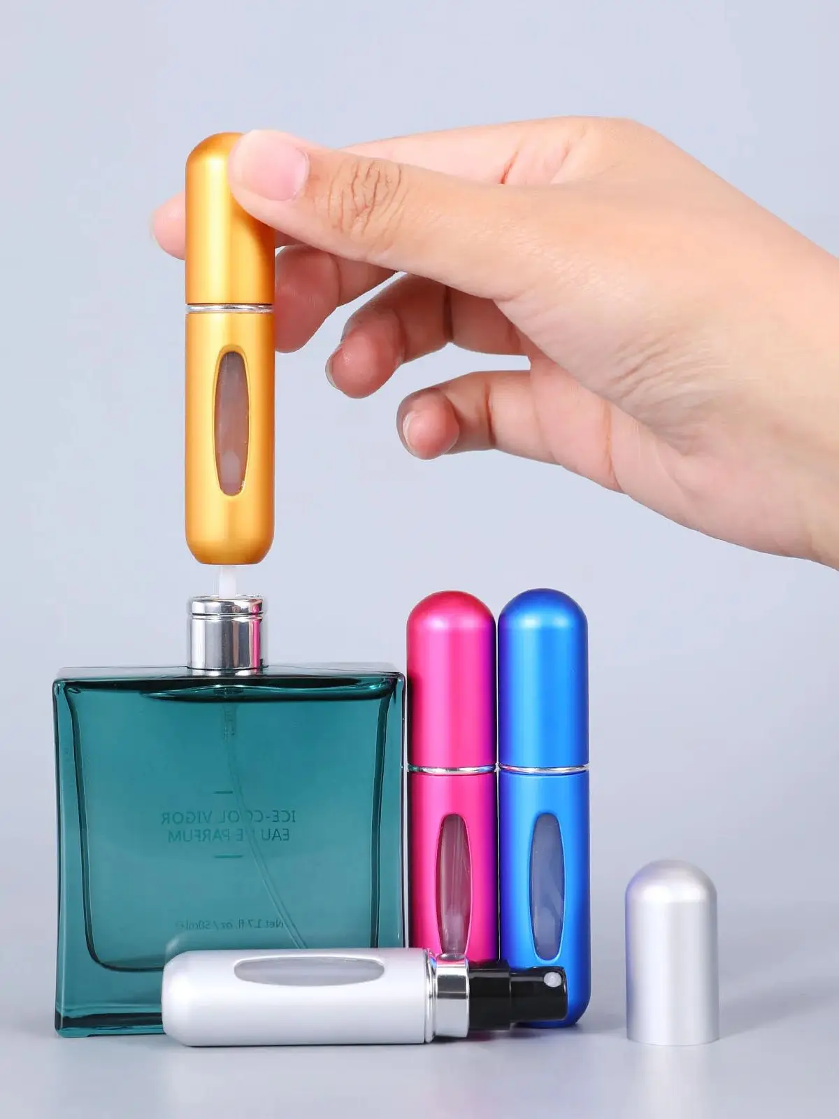 YS00082--Multicolore 5ml auto-pompe fond rechargeable parfum bouteille séparée portable vaporisateur bouteille combinaison de voyage