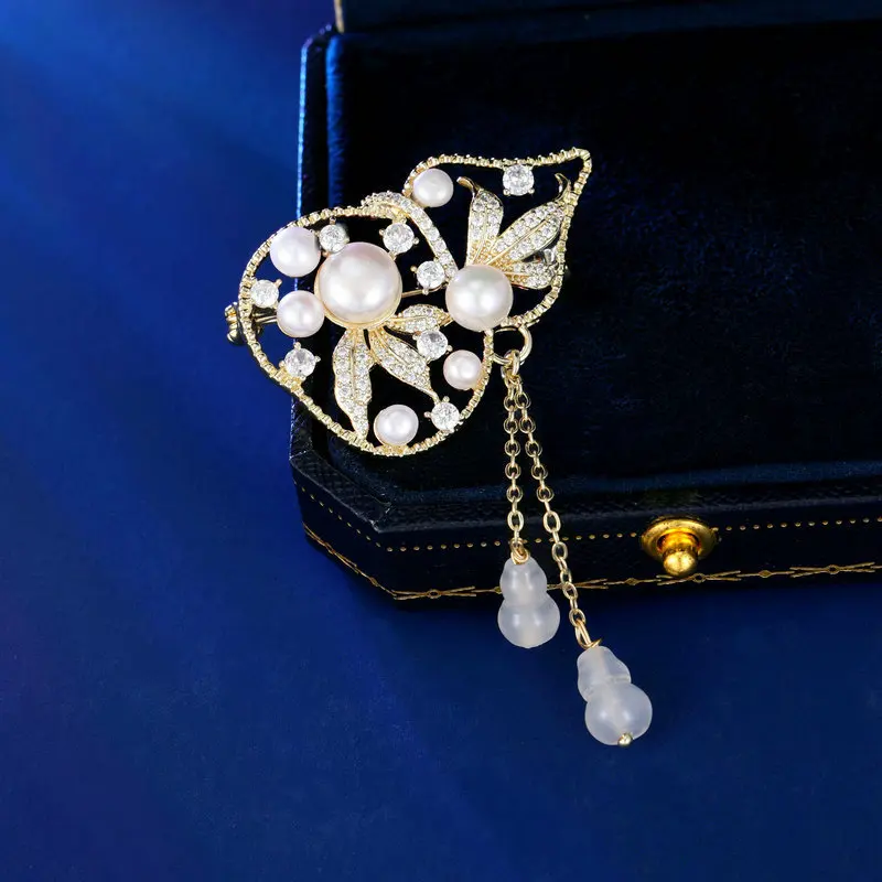 Spilla cheongsam elegante e raffinata da donna, perle d'acqua dolce e spilla con zucca fortunata