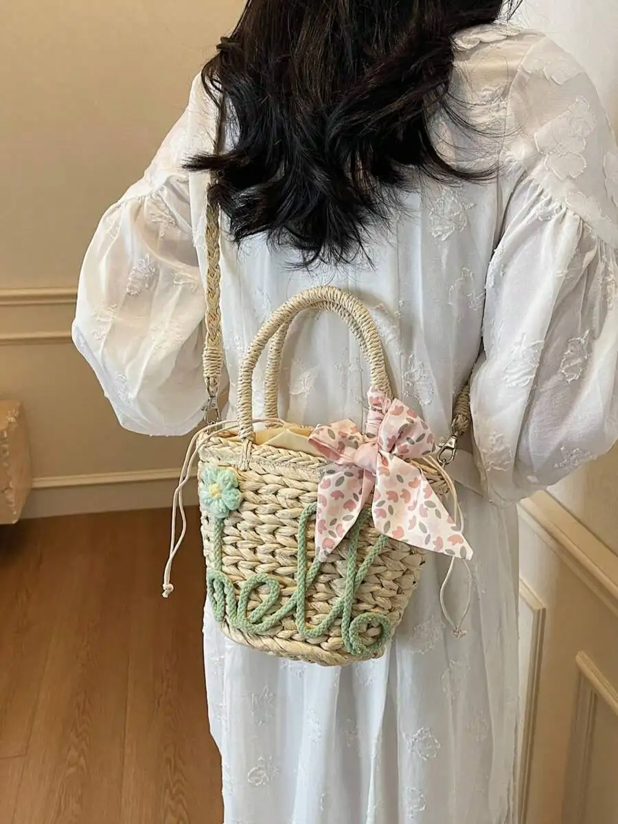 

Mini Straw Bucket Bag With Letter & Flower Decor, Drawstring Closure Handbag/Crossbody 2-In-1, Sweet Girl Style, Handwoven Straw Bag For Spring/Summer Outings, Gifts, Daily Commute, Dates, Parties, Beach