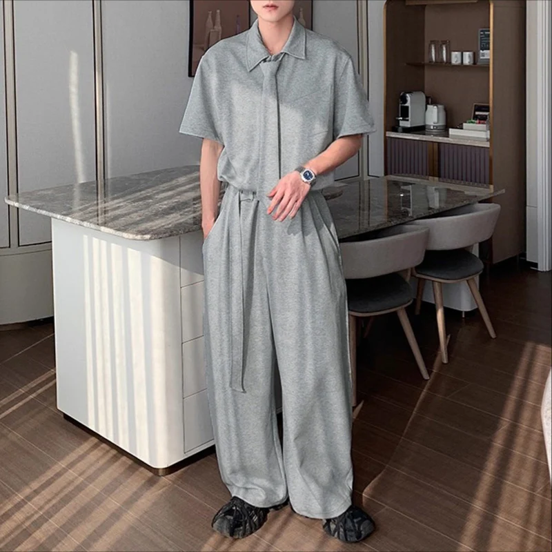 

INCERUN Мужские комплекты Однотонная рубашка с короткими рукавами и брюки с лацканами Комплекты из двух предметов Свободная уличная одежда 2025 Модные повседневные мужские костюмы