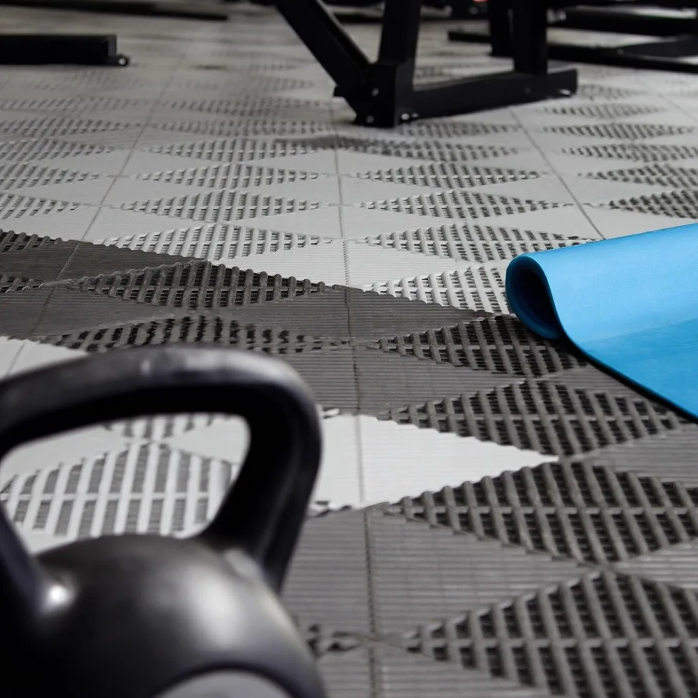 Piastrelle ad incastro a costine per pavimenti in garage: pavimenti ventilati, autodrenanti, antiscivolo, modulari in polipropilene, ideali per la sicurezza