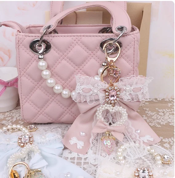 

Japanese pink bow flower pleated handlebar shoulder bag lady sweet cute Lolita handbag lady bag bow rhinestone mine bag hanging