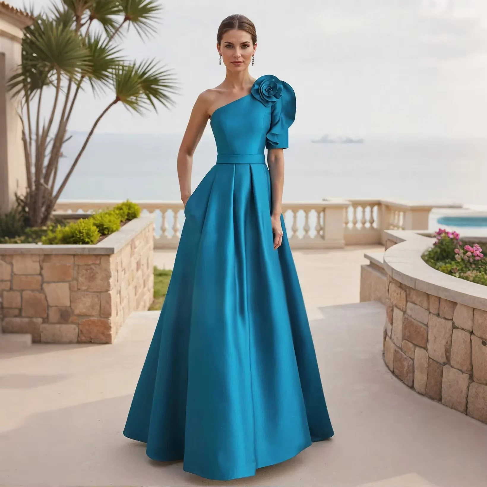 Unique one-shoulder long gown with floral decoration, made of stiff satin. High waist matched with elegant A-line skirt with hid