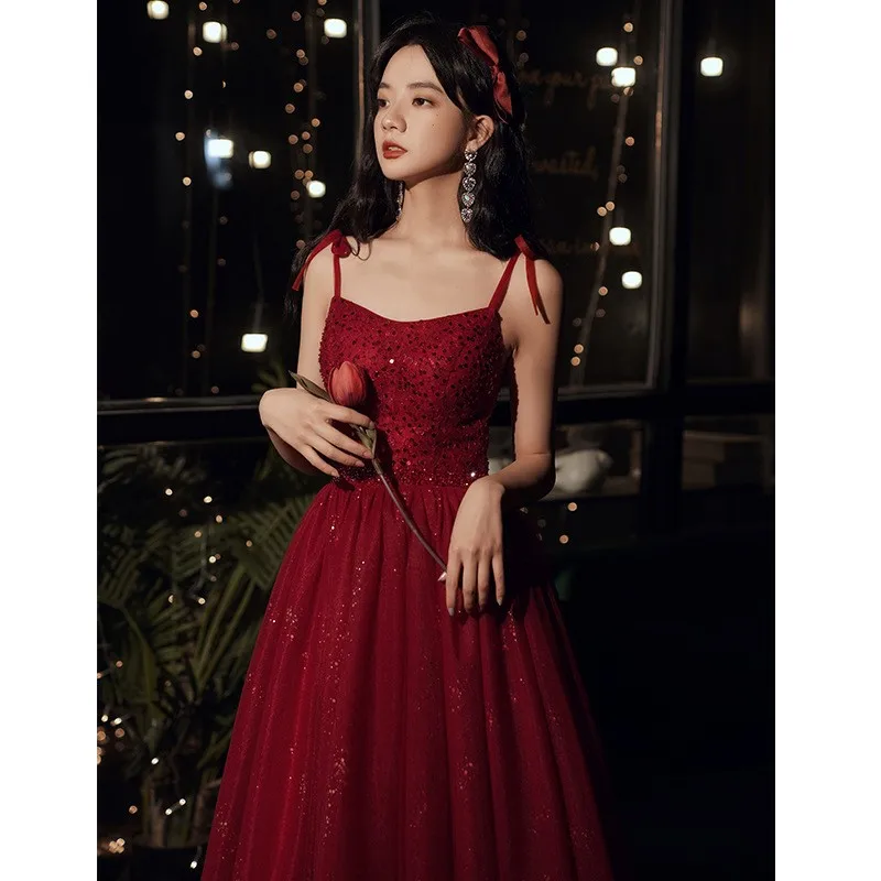 

A new wine red halter dress casual for toasting