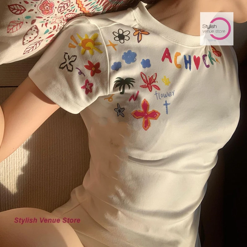 

American shoulder spice short sleeve T-shirt female summer new fashion student graffiti printing slim slim design ins shirt