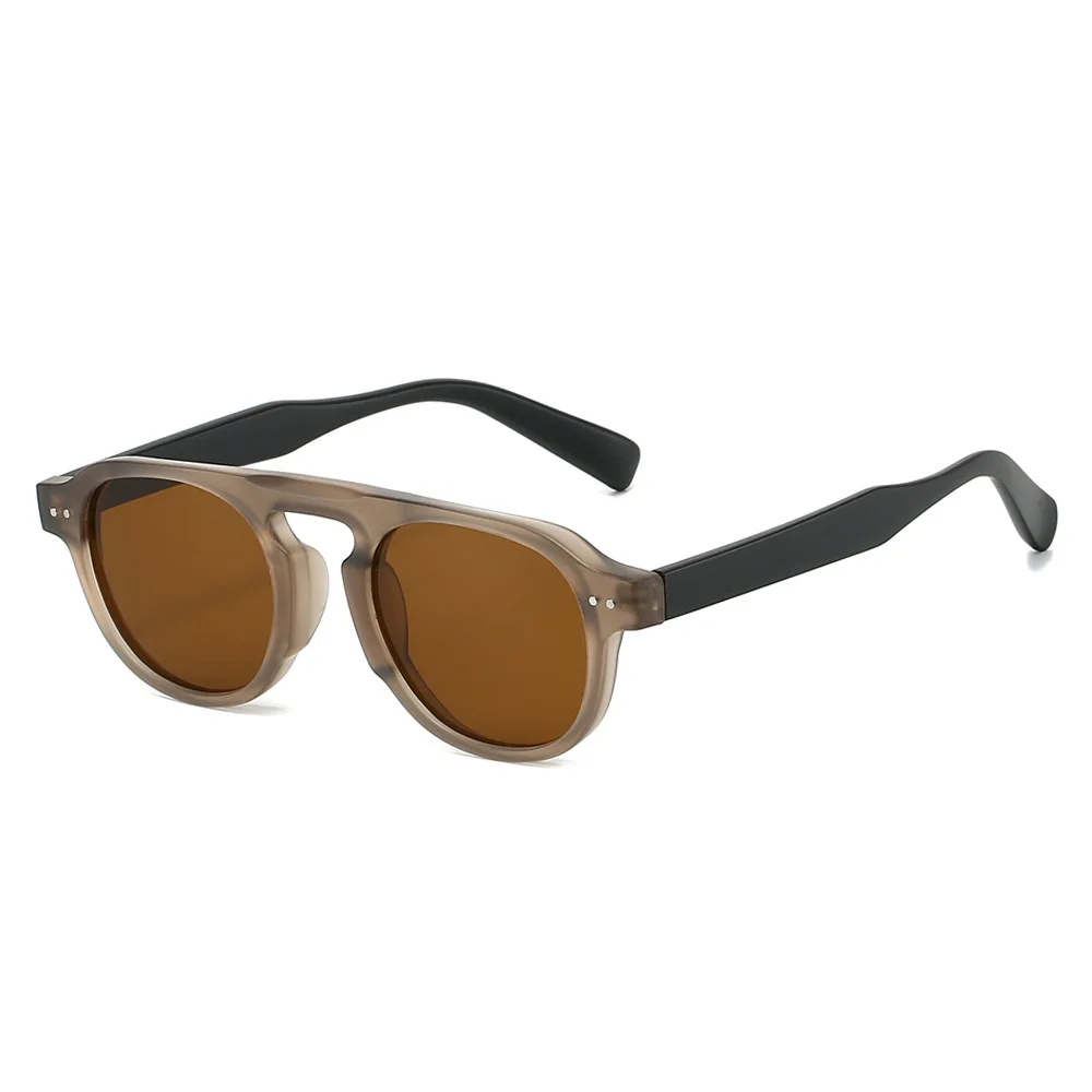 Nueva llegada TR90 gafas de sol mujeres hombres estilo piloto gafas de sol Retro UV400 conducción viaje remaches decoración tonos