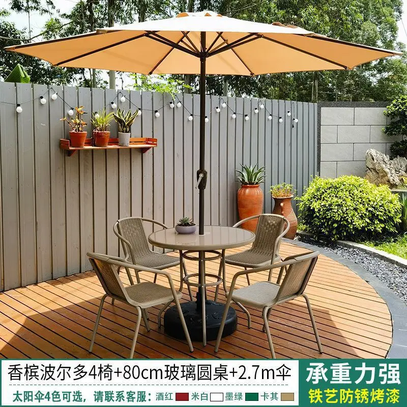 Fotografia 7: Conjunto de mesa, cadeira e guarda-sol para pátio externo, ideal para lazer ao ar livre em cafés de chá com leite.