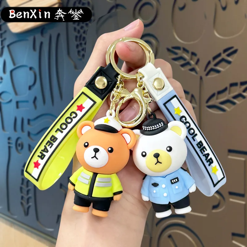 Minso Cartoon-Polizeibär-Schlüsselanhänger, Feuerwehrmann-Bärentaschen, Autoanhänger, Krallenmaschinen, kleine Geschenke für den Straßenstand