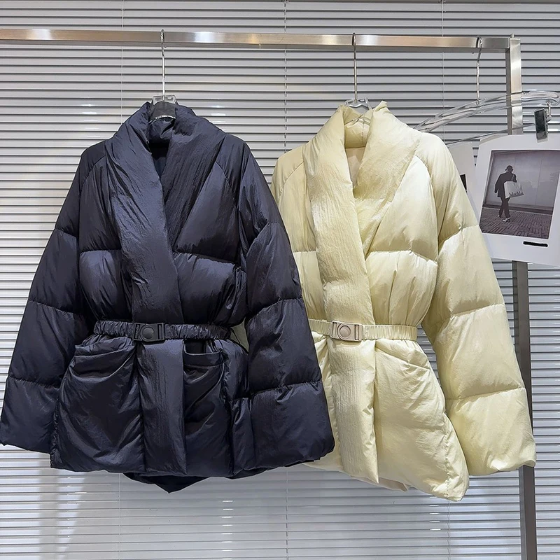 Winter new niche style belt with waist cinching design jacket women elegant and fashionable solid color warm down jacket