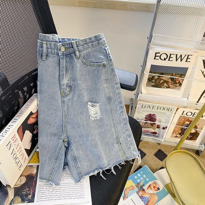 Pantaloni al ginocchio in Denim strappato con foro estate 2024 delle donne nuovi pantaloni da ciclismo con spacco dritto a vita alta coreani pantaloni centrali