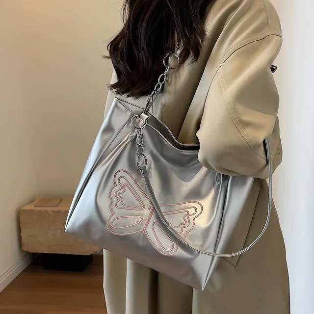 

Women's Metallic Silver Tote Bag with Butterfly Embroidery - Stylish Chain Strap Shoulder Bag for Trendy Casual Looks
