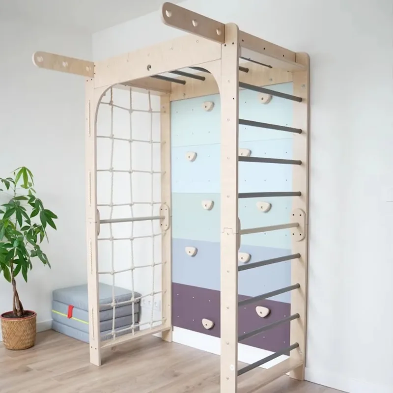 

Детская игровая площадка с скалодромом для помещений, гимнастическим комплексом и лестницей