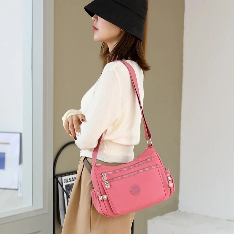 

Женская сумка через плечо, водоотталкивающая нейлоновая сумка-кроссбоди, повседневная уличная сумка с несколькими отделениями и большой вместимостью для поездок на работу.