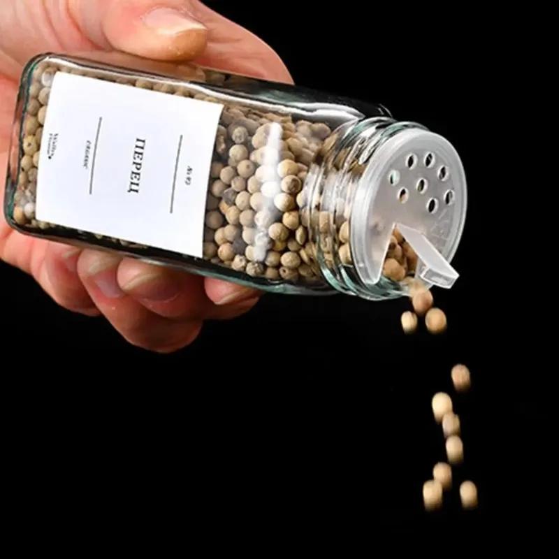 برطمانات توابل زجاجية مع ملصق مع أغطية خشب السنط، زجاجات توزيع زجاجية محكمة الغلق، زجاجات فارغة شفافة، منظم توابل