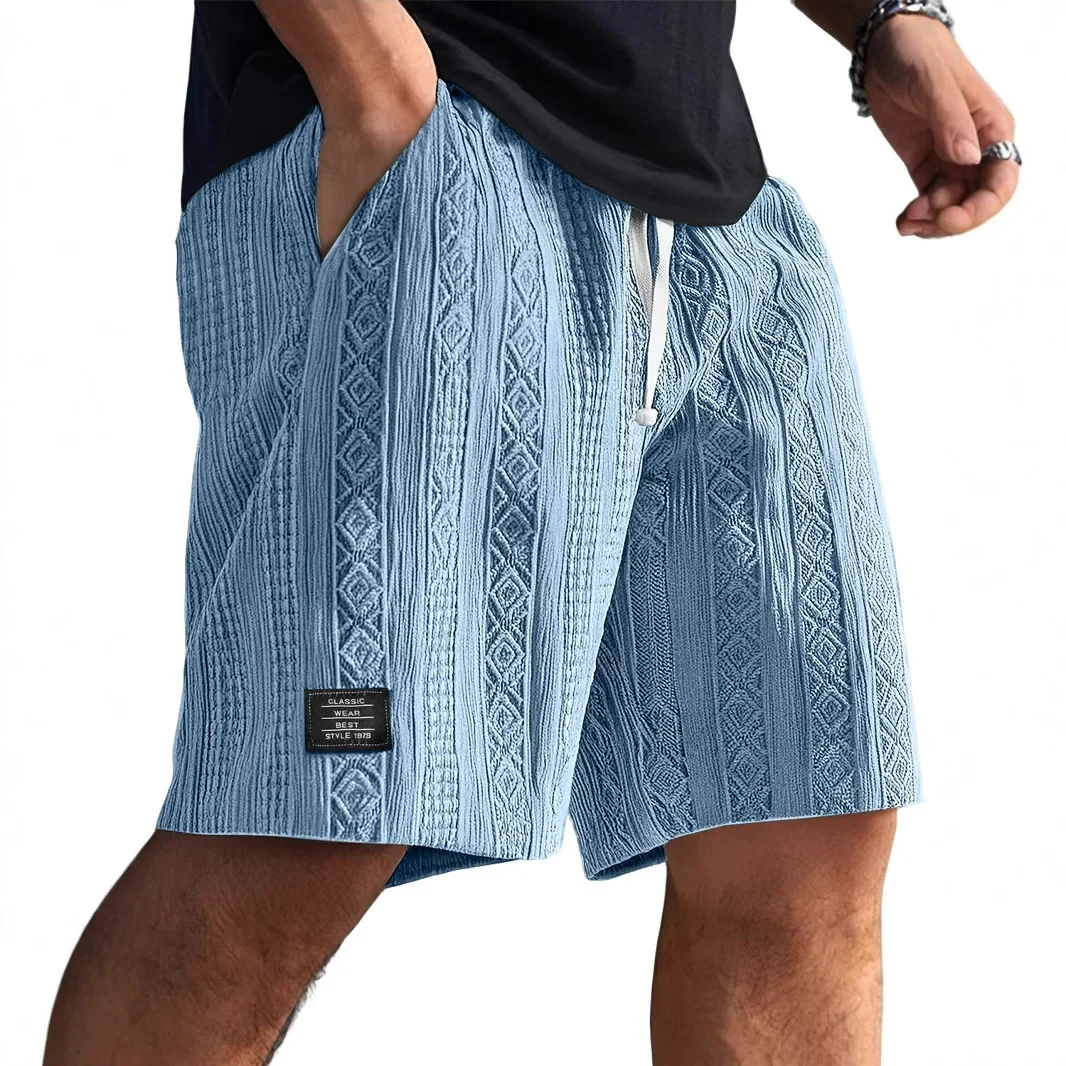 Pantaloni corti da uomo comodi e casual Texture Logo della moda Pantaloncini da spiaggia per uso quotidiano Pantaloncini estivi per il tempo libero da uomo con fantasia elegante