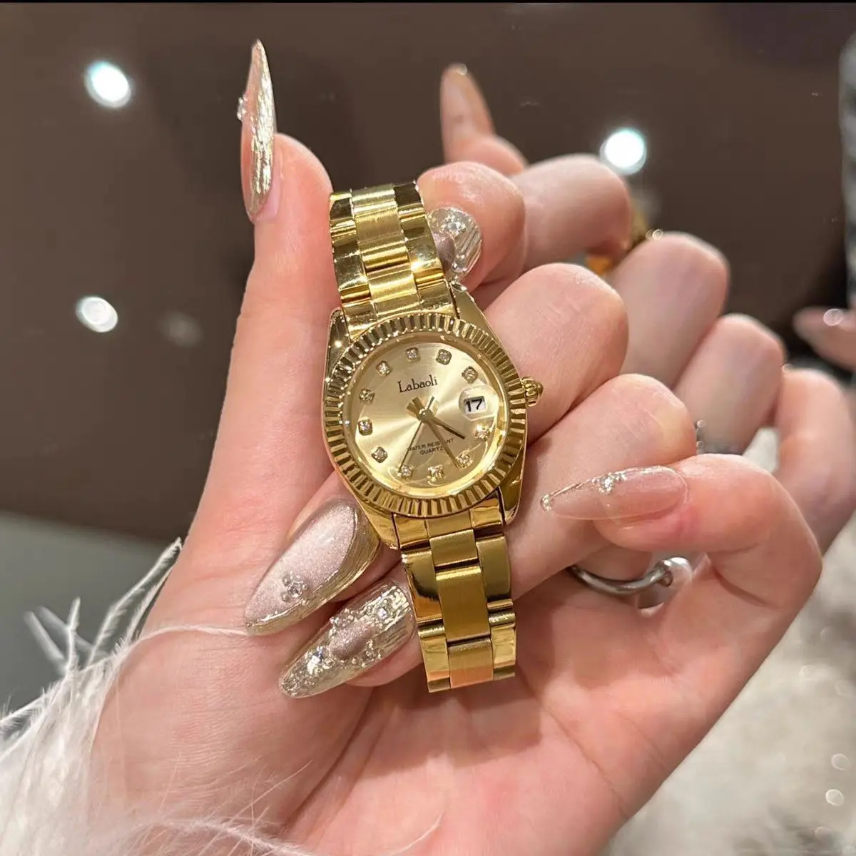 Elegant ladies watch, the same style small gold watch, personality and creative design, simple steel band, elegant ladies watch