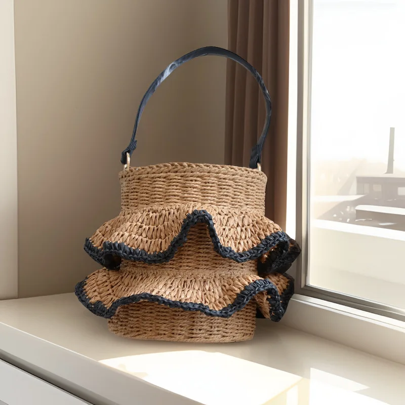 

2025 French Fashion New Original Folded Skirt Bucket Shaped Hollow Weaving Handbag Summer Beach Vacation Beach Women's Bag Trend