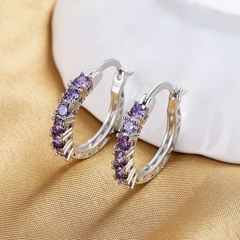 

European and American women's fashion temperament circle hollow inlaid pliers purple zircon earrings earrings