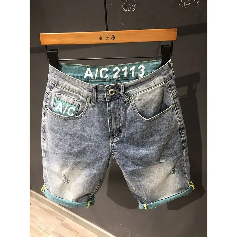 

Рваные джинсовые шорты с принтом, мужские модные брендовые летние тонкие корейские версии, облегающие брюки среднего размера, молодежные модные брюки