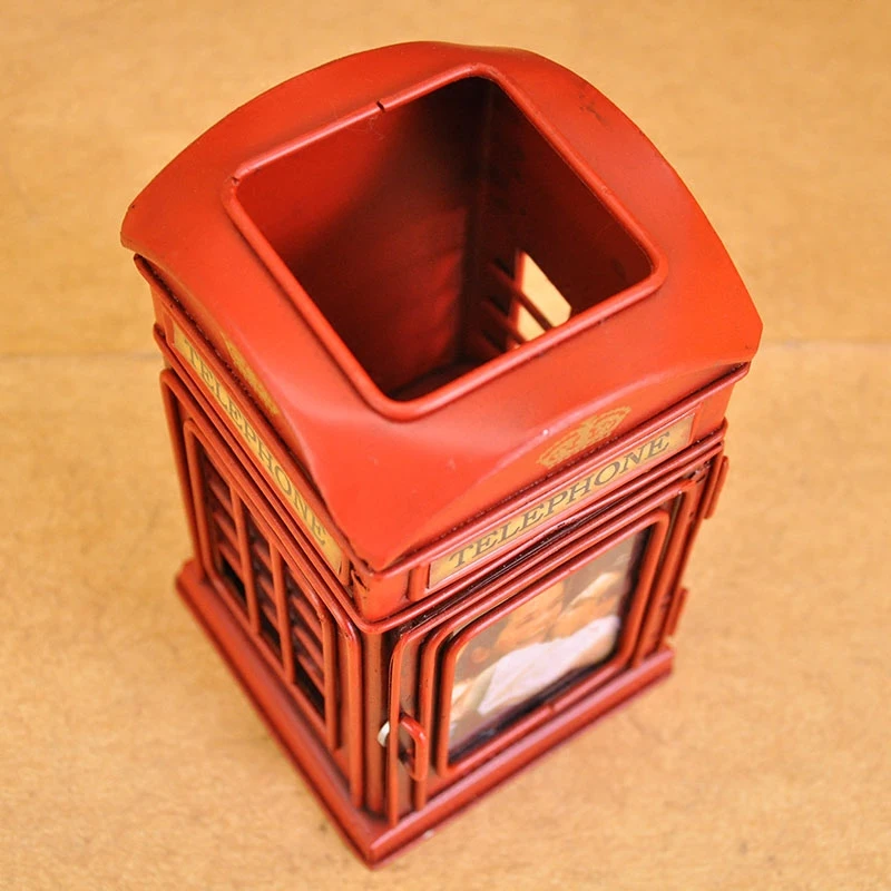 Retro iron desk organizer shaped like a classic British phone booth with handcrafted finish ideal for study spaces wine red hue