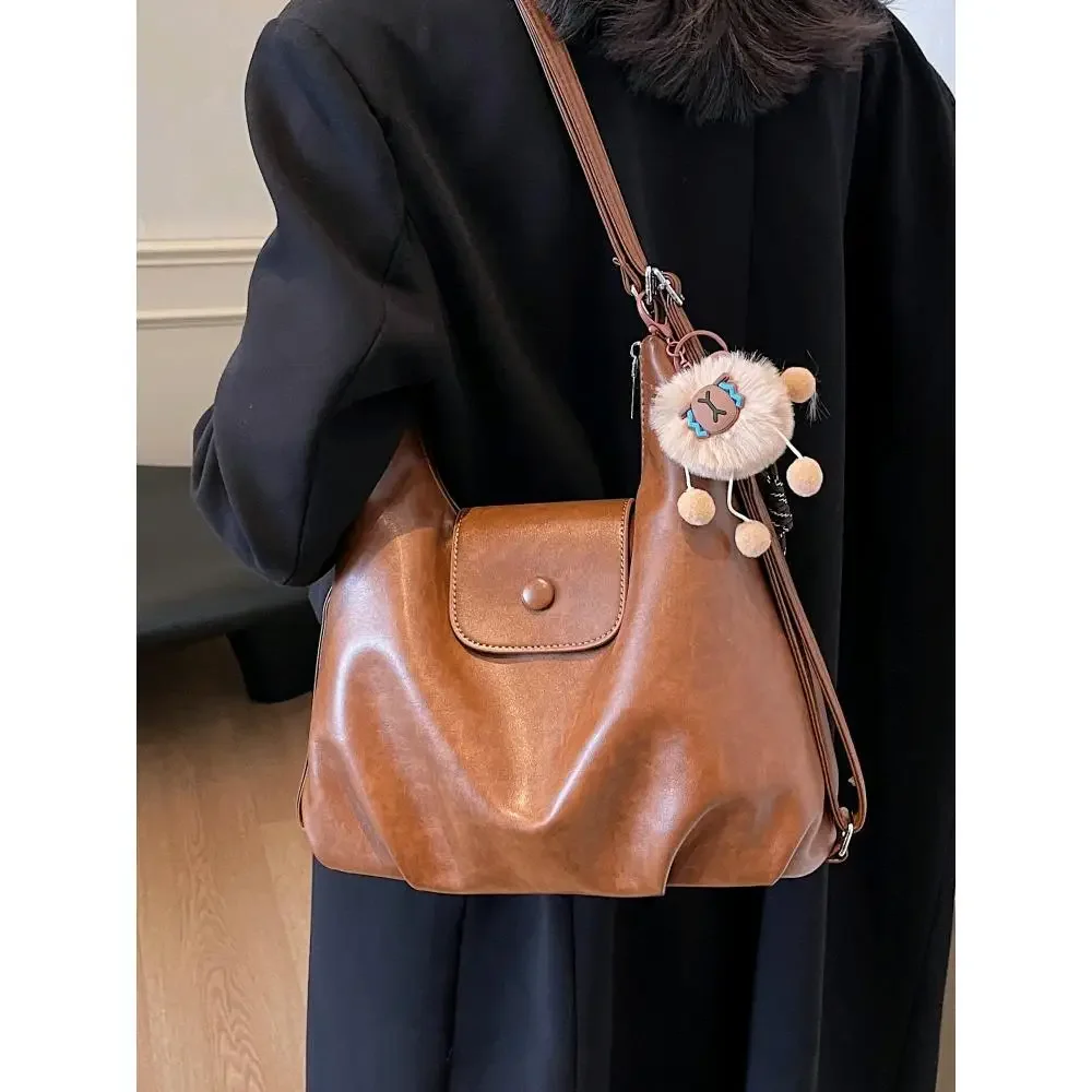 

Vintage PU Leather Shoulder Bag for Women, Lightweight Large Capacity Handbag with ornaments Commute Shopping Backpack Purse