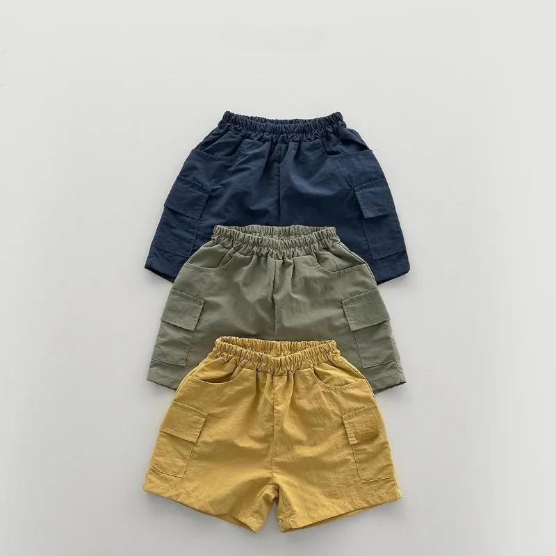 

2026 Summer New Children Cargo Shorts For Boys Girls Casual Pants Baby Solid Sports Shorts Cute Toddler Loose Pants Kids Clothes