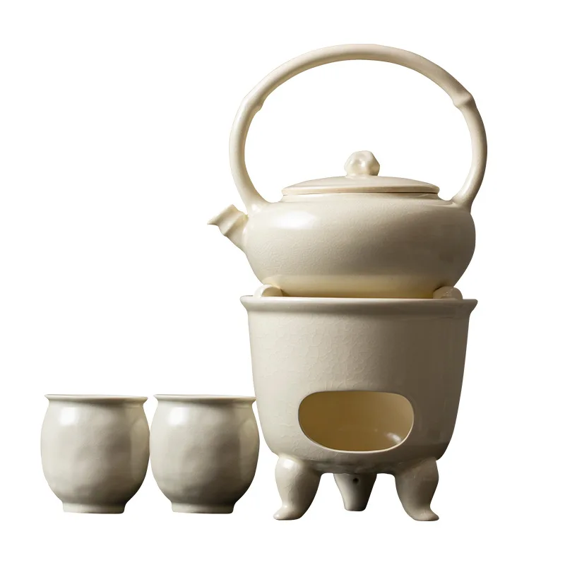 

Small household alcohol tea making set creative three-legged warm tea stove soda glaze open flame boiling teapot kettle retro