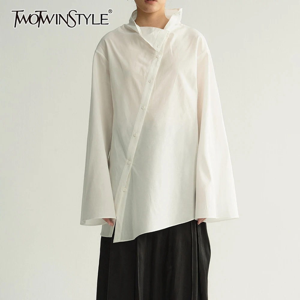 TWOTWINSTYLE Asymmetric Spliced Sheer Loose Blouse for Women Stand Collar Wide Sleeve Patchwork Button Solid Blouses Female New