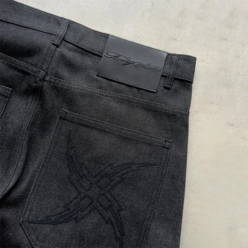 Y2K-pantalones vaqueros Vintage de alta calidad con patrón X abstracto, bolsillos traseros bordados, vaqueros de pierna recta negros, ropa de calle de moda para hombres y mujeres