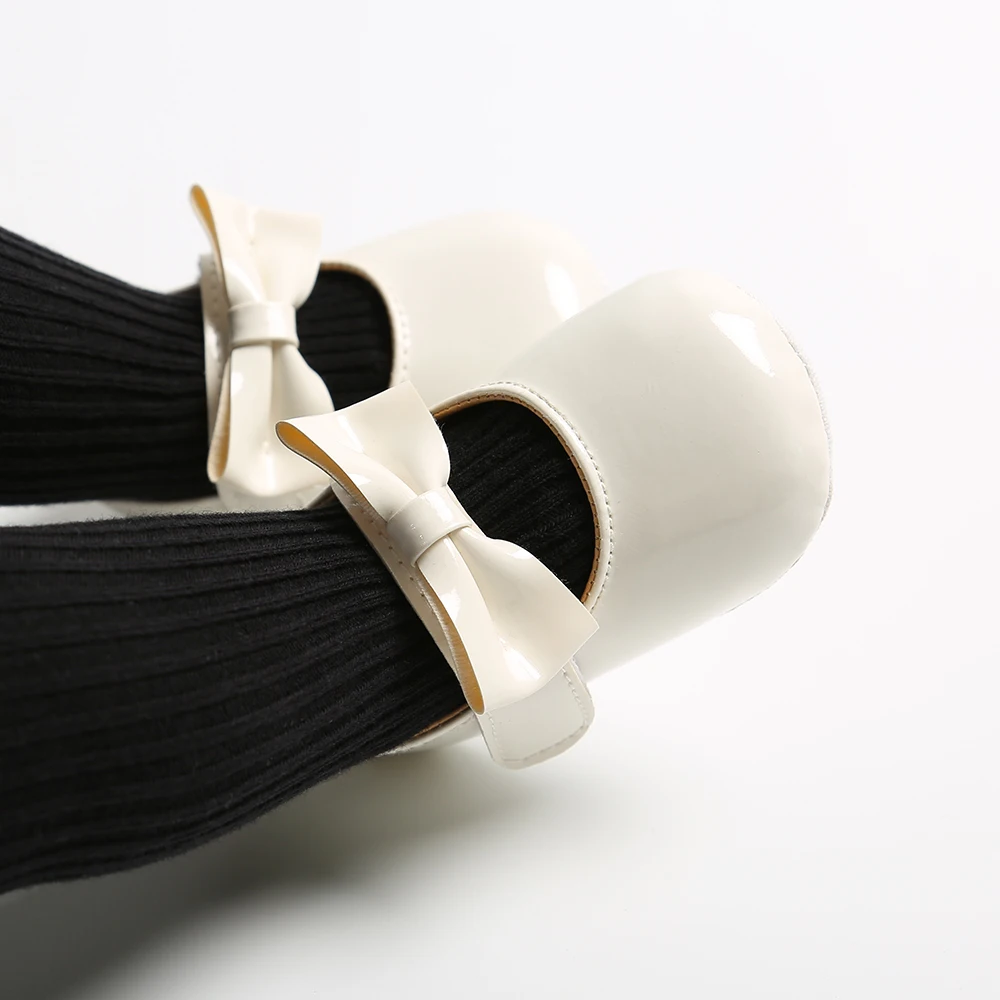 أحذية نسائية للأطفال حديثي الولادة أحذية أطفال من البولي يوريثان بفيونكة مضادة للانزلاق أحذية تنورة الأميرة الكلاسيكية أحذية المشي الأولى للأطفال