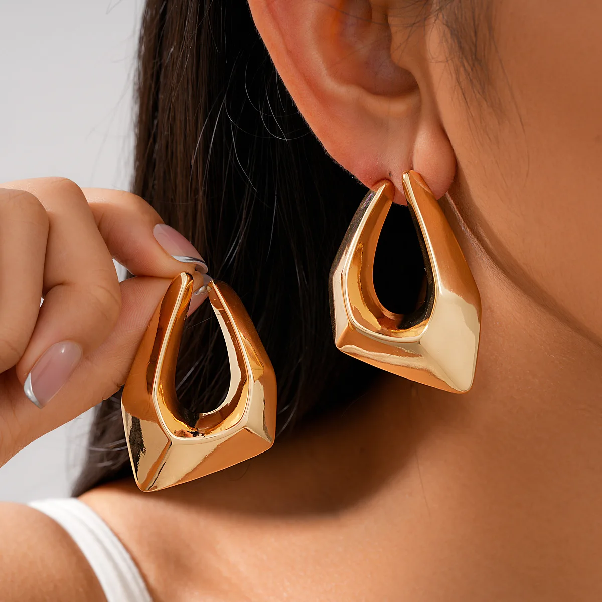 Exaggerated irregular hollow triangular stud earrings light luxury high-end earrings fashion versatile temperament earrings