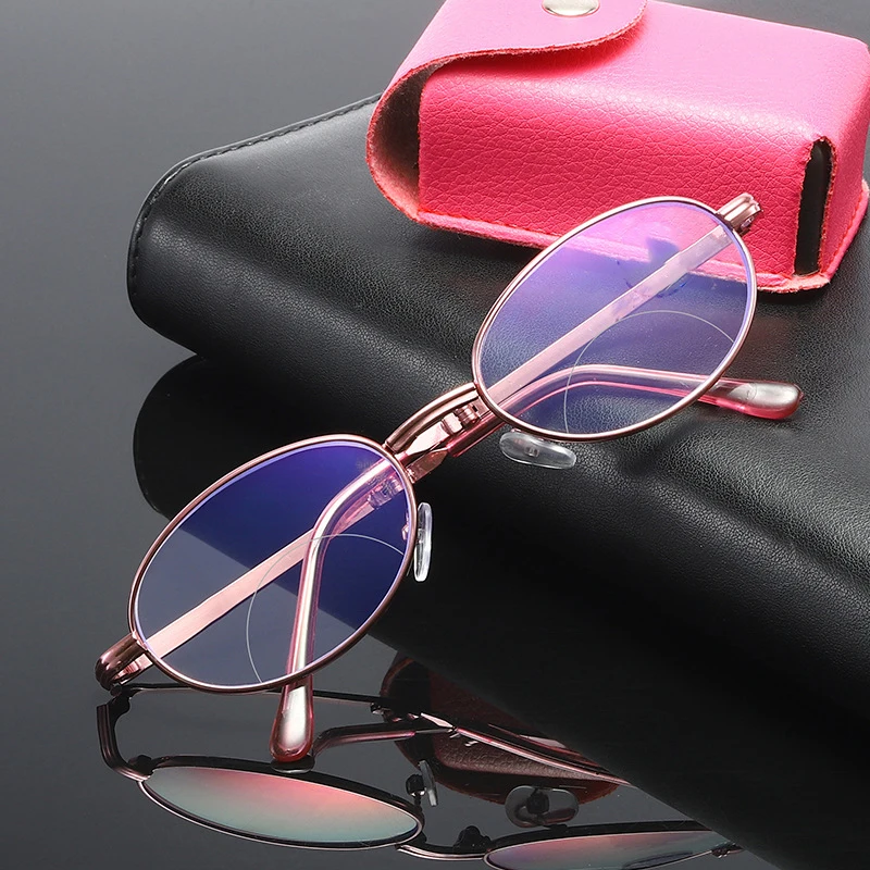 Bifokale Damen-Lesebrille mit Anti-Blaulicht, faltbarem Etui, ovales Rosa, für Presbyopie.