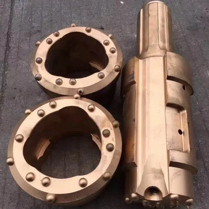 Symmetrical overburden drilling equipment, rock drilling bits, ore mining tools, accessories