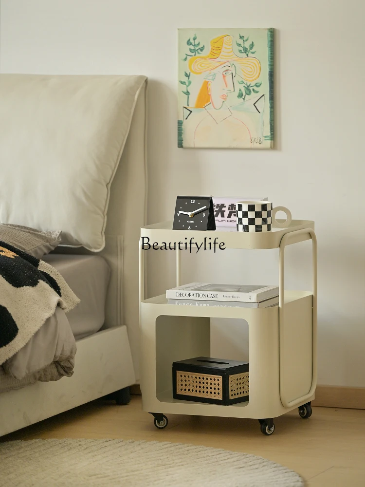 

*small side of wrought iron bedside shelf in bedroom replaces the artifact storage cabinet.